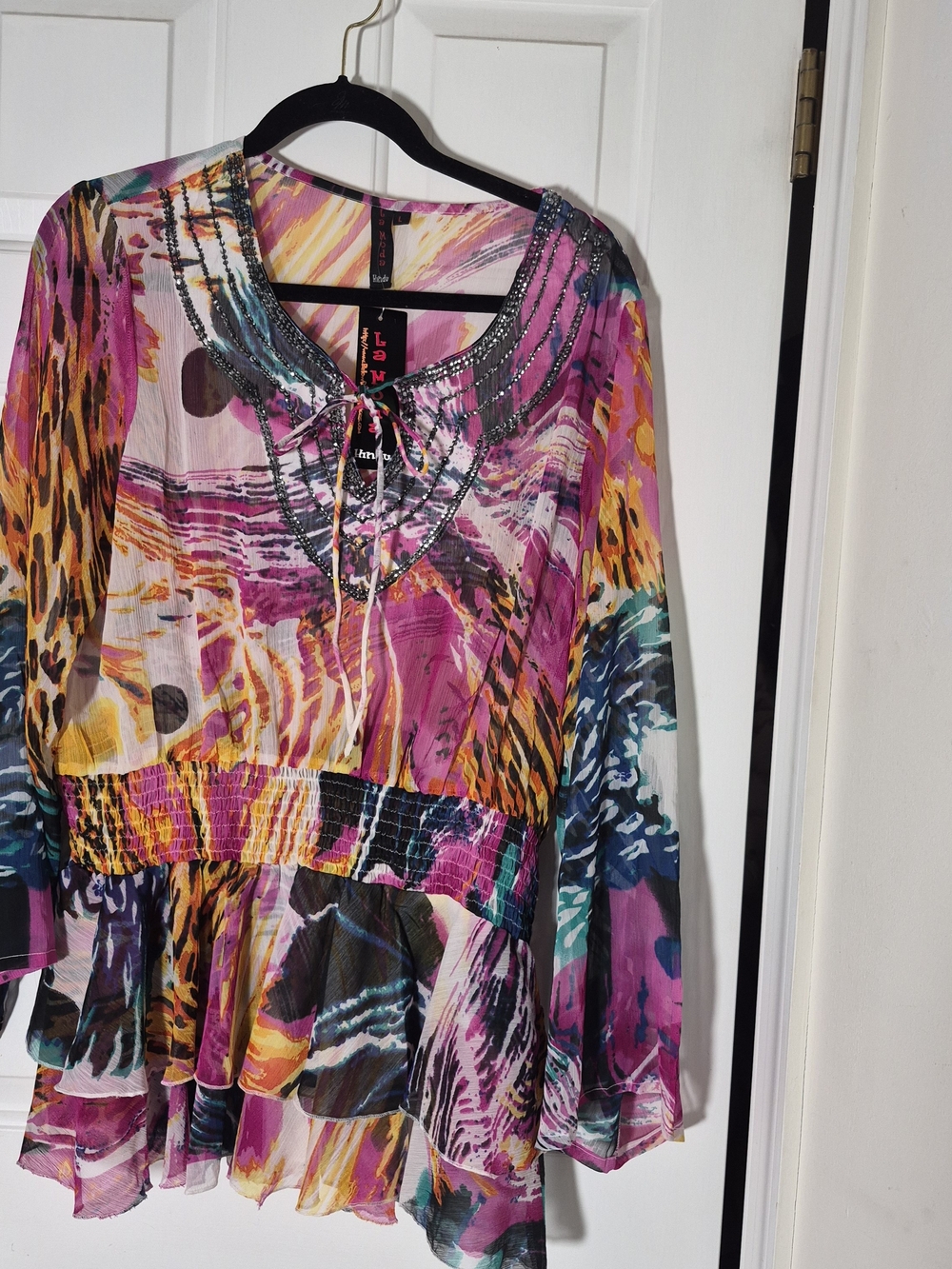La Moda Multicolor Sheer Printed Peplum Tunic — Pink & Teal Accents